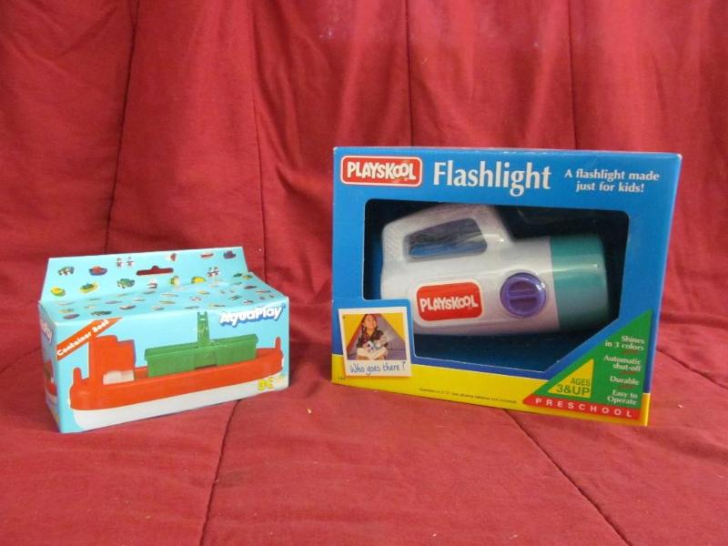 lot 94 image: Playskool flashlight and Aqua Play ...