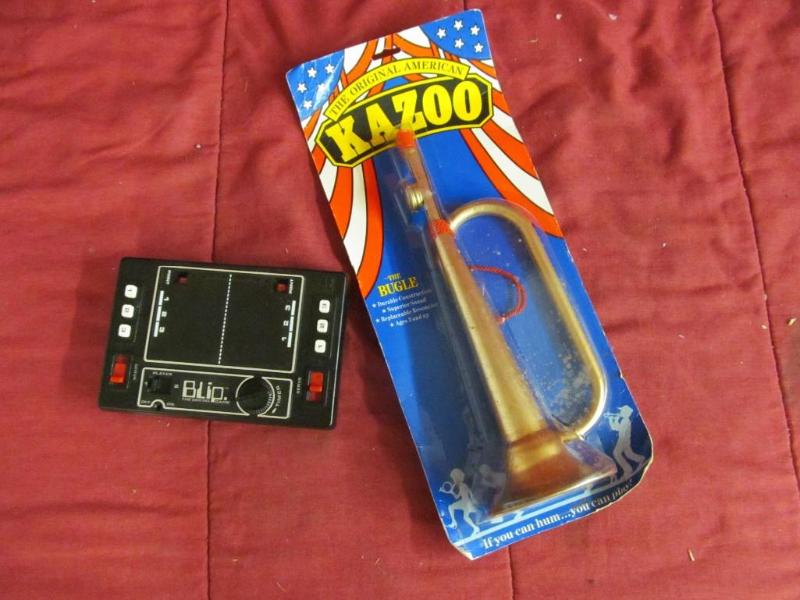 lot 99 image: Blip Digital Game and Kazoo the Bug...