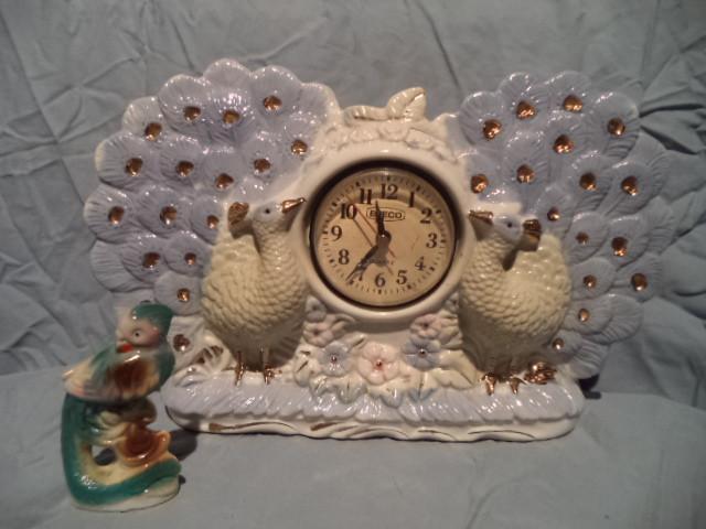 lot 63 image: Peacock Clock