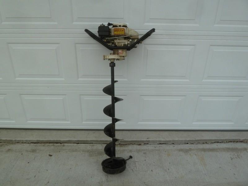 lot 21 image: Jiffy Ice auger Model# 30 Has 3 Hp...