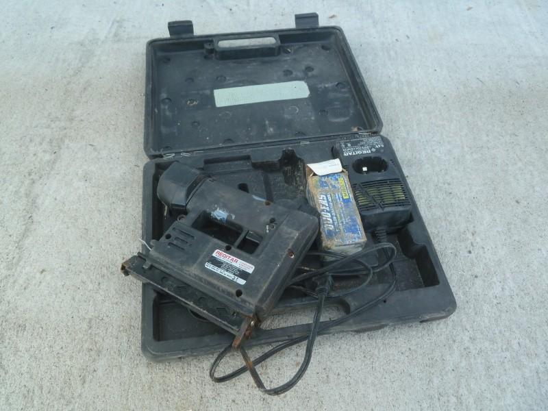 lot 48 image: Regitar Staple Gun Model# RT 70149...