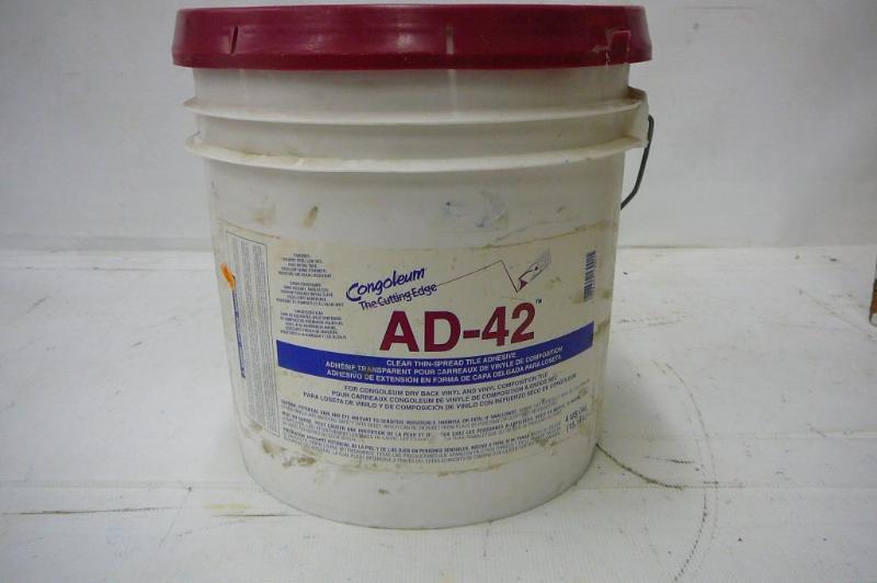 Thin Spread tile adhesive congoleum...