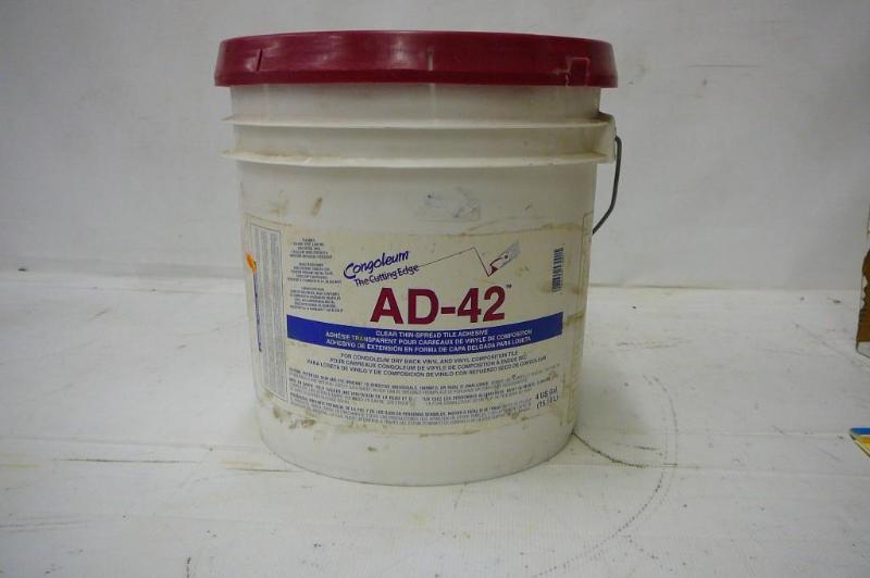 Thin Spread tile adhesive congoleum...