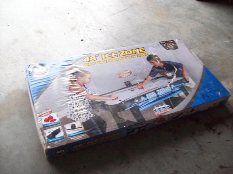 Air hockey table -48&quot -In box...