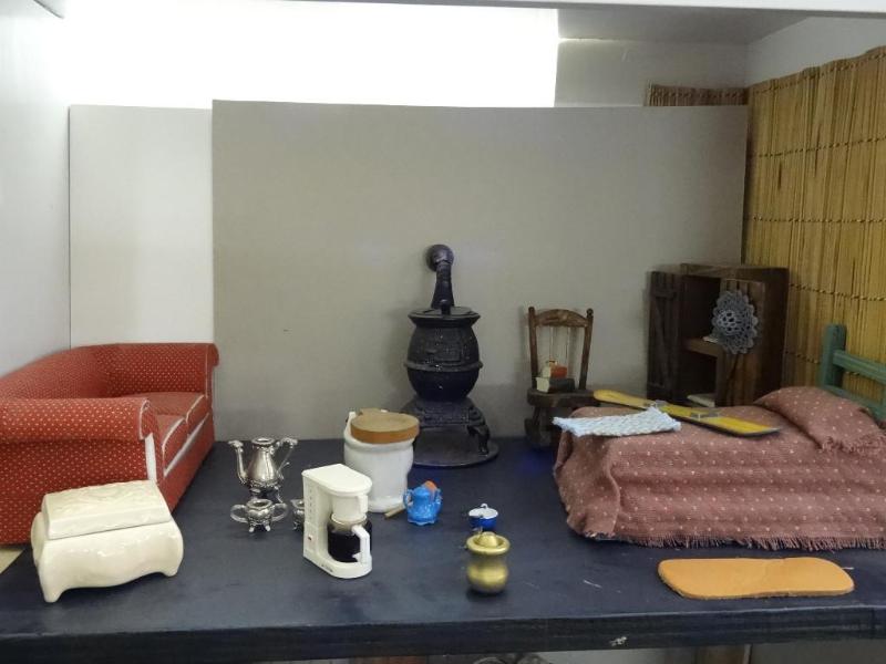Sofa, Bed, Metal Potbelly Stove and...