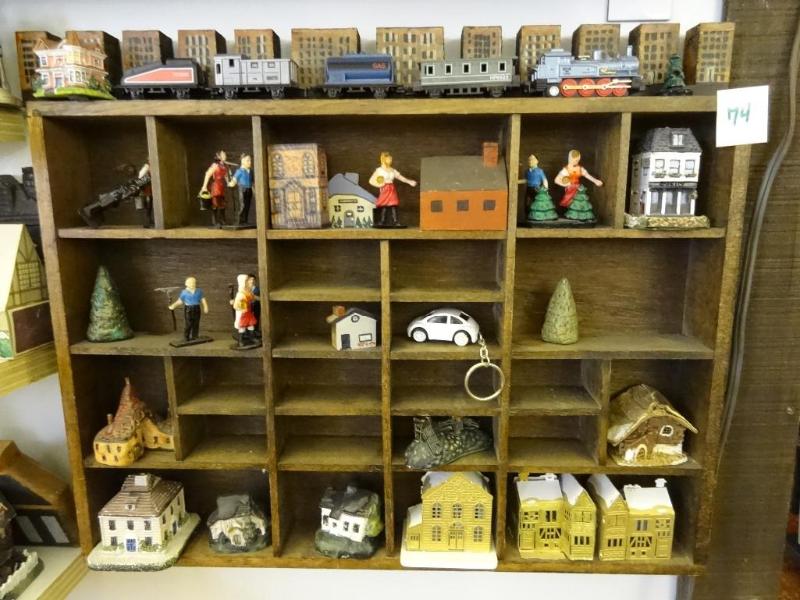 Shelf with Miniature Houses and Tra...
