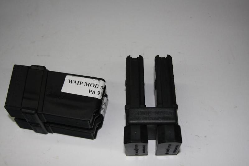 lot 25 image: Beowolf .50 clips. 4 five rounders....