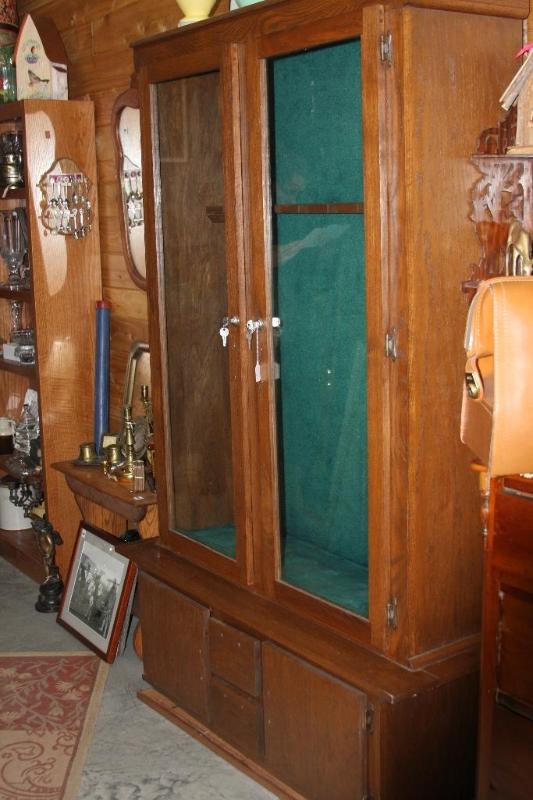 lot 33 image: Oak Gun Cabinet with glass doors. H...