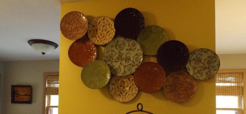 lot 10 image: Metaltin plate collage.  Can ...
