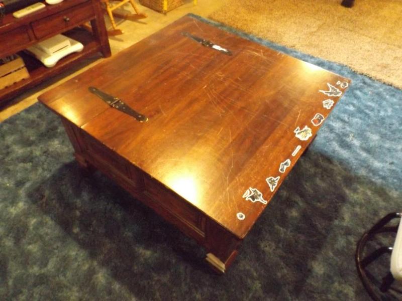 lot 28 image: Solid wood table, has some scratche...