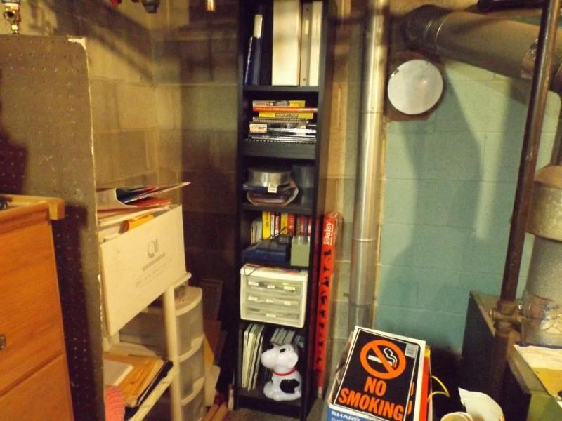 lot 35 image: Black laminated particle board shel...