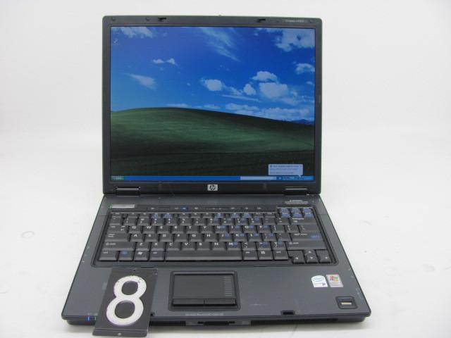 lot 8 image: HP compaq nc6320 laptop computer. T...