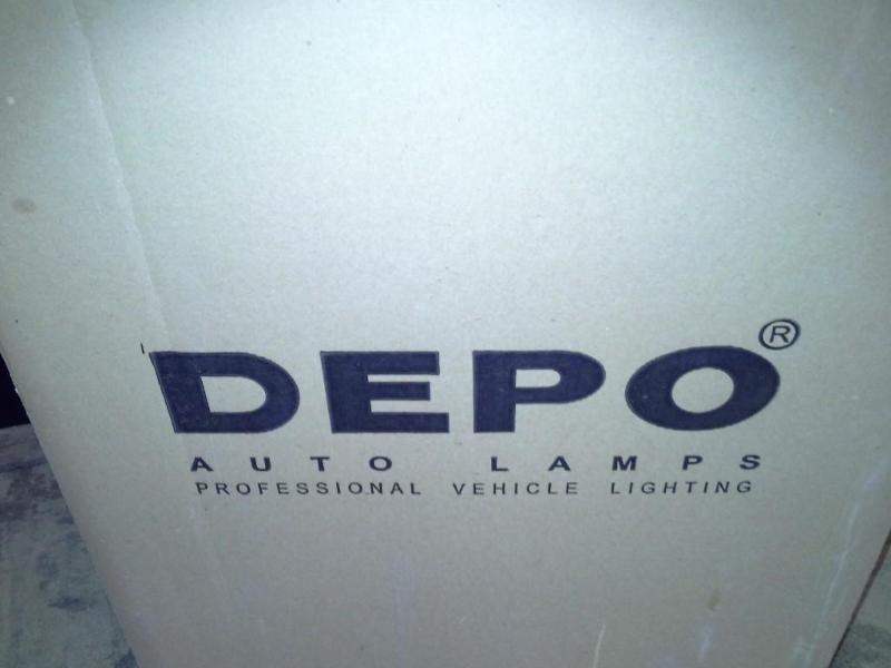 lot 128 image: Headlight Assembly Set