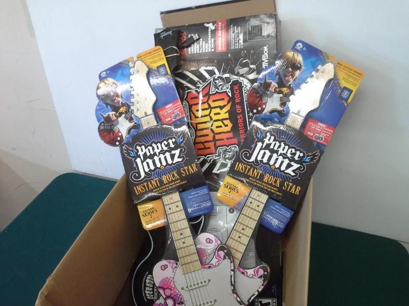 lot 365 image: Toy Guitars