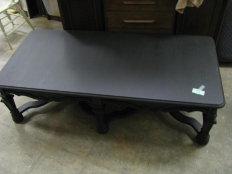 very nice black larger coffee table...