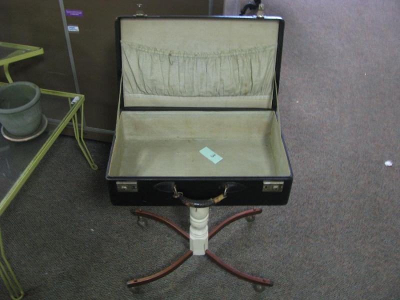 Vintage suitcase made into a table ...