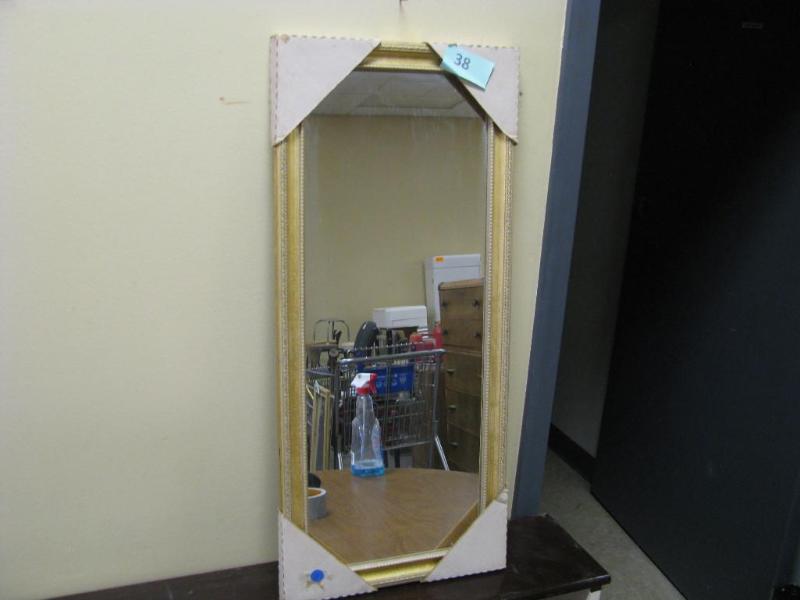 golden framed mirror...