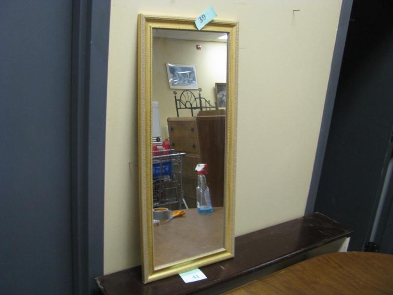 golden framed mirror...
