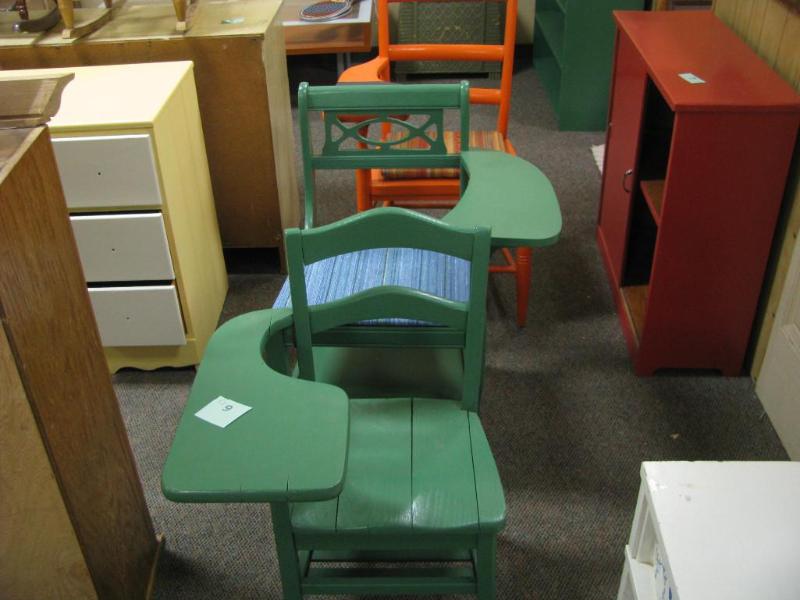 two painted school desks one with c...