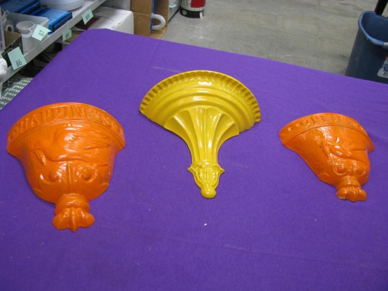 three metal wall planters yellow an...