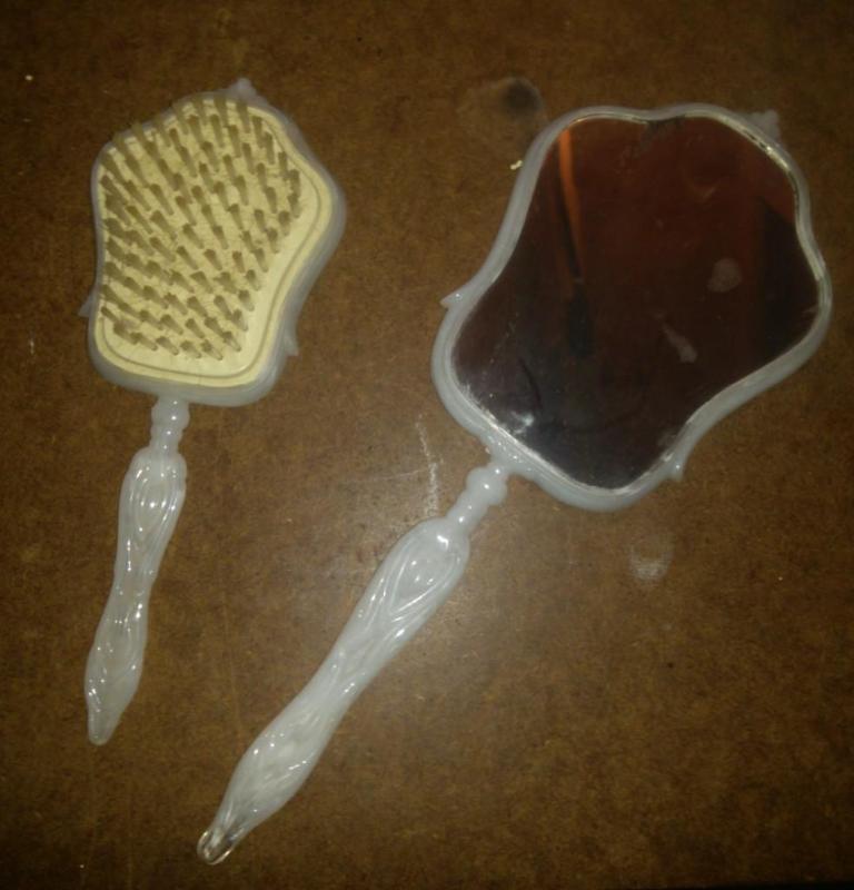 Vintage mirror and brush set with a...