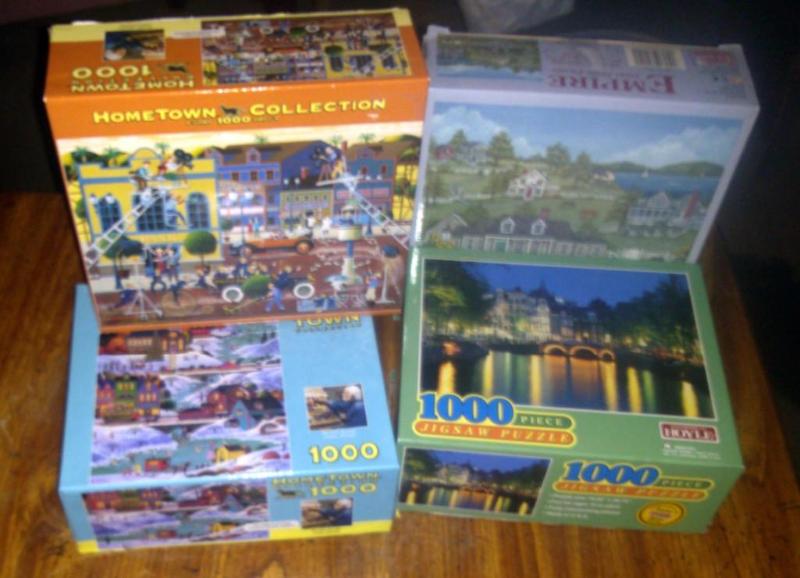 Lot of 4 1000 piece puzzles...