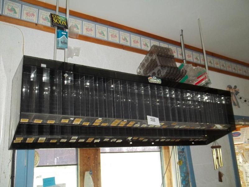 Cigarette rack and chewing tobacco ...