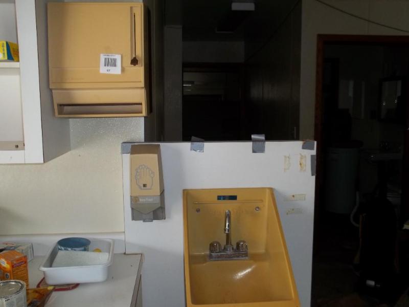 Paper towel dispenser, sink, and so...
