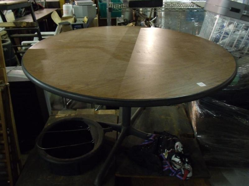 lot 10 image: 42" round table with metal fra...