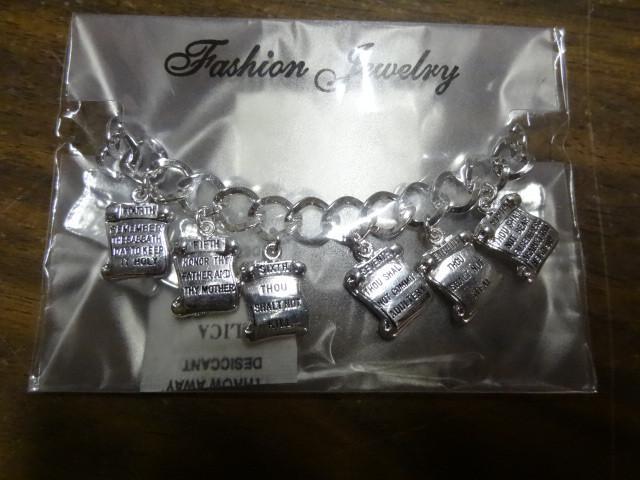 lot 100 image: Ten commandments bracelets. Qty 50...