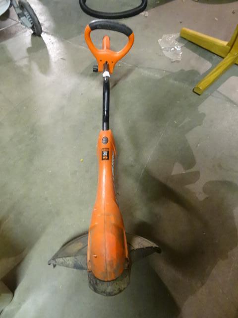 lot 114 image: Black and Decker grass hog. 110 vol...