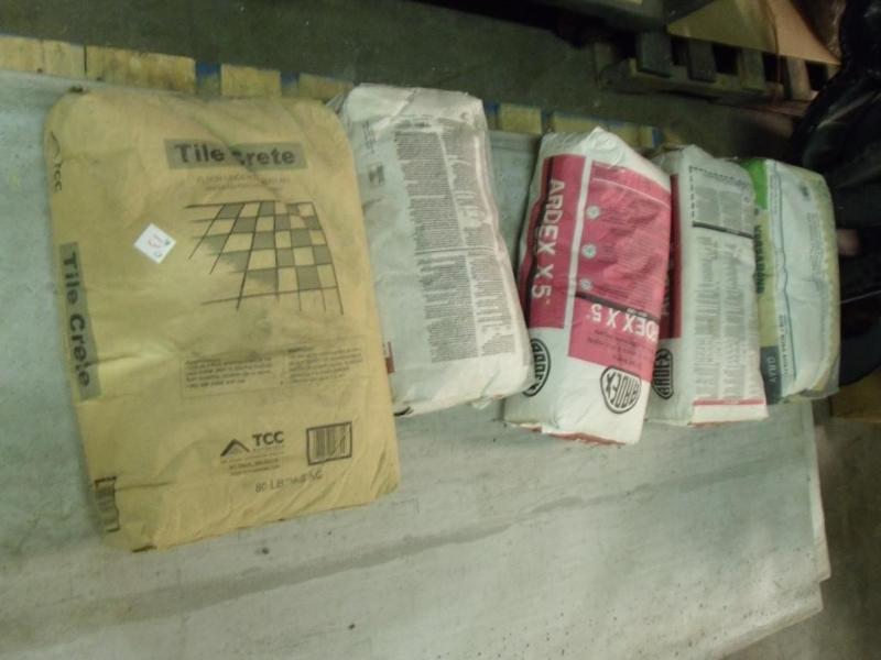 lot 13 image: 1 bag of tile underlayment mix. Lat...