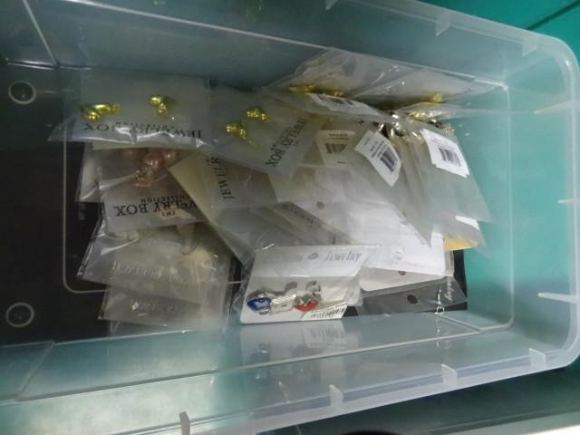lot 138 image: Bin of misc earrings. Bin not inclu...