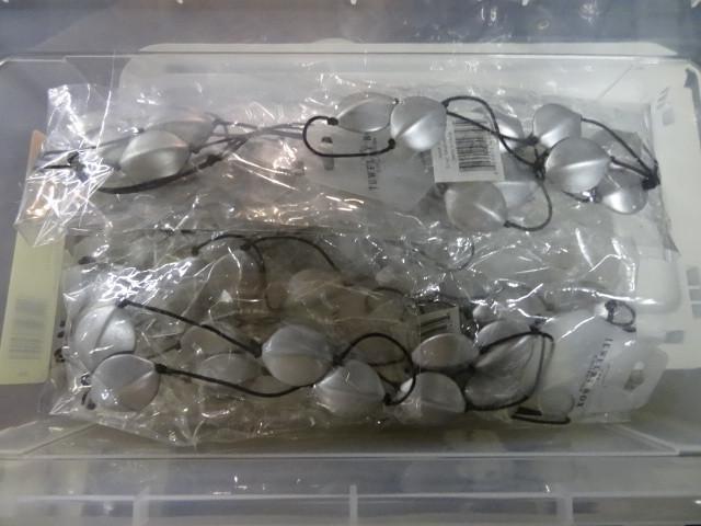 lot 141 image: Bin of token necklaces. Bin not inc...