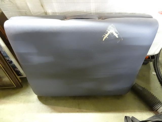 lot 146 image: Portable massage table. One tear. S...