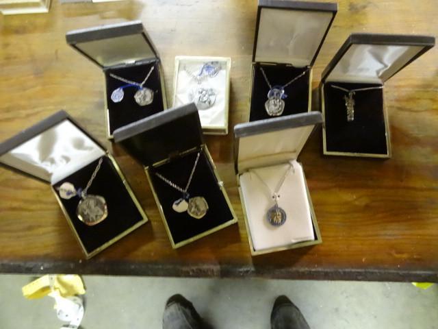 lot 155 image: 7 religious necklaces...