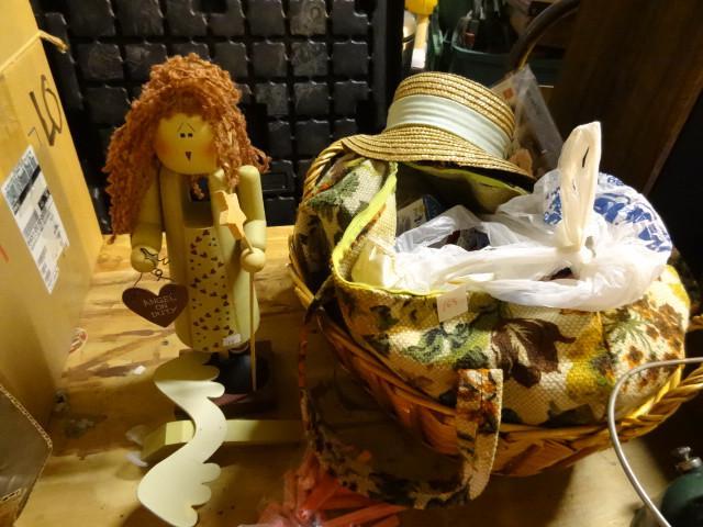 lot 168 image: Angel nut cracker. Doll clothes and...