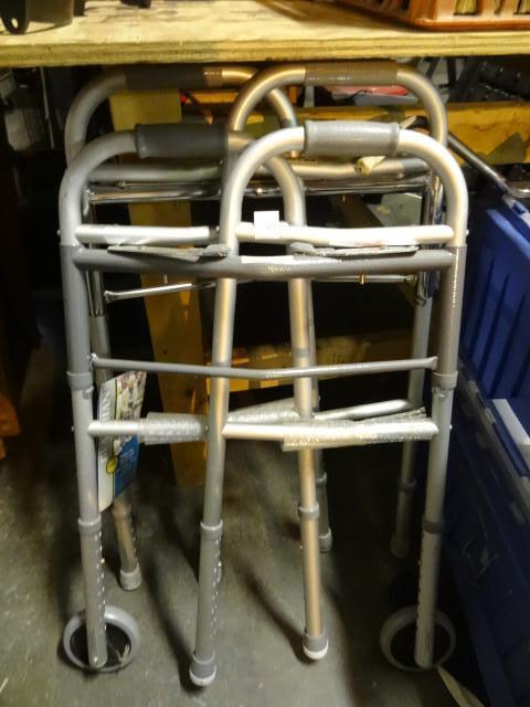 lot 176 image: 2 fold up walkers...