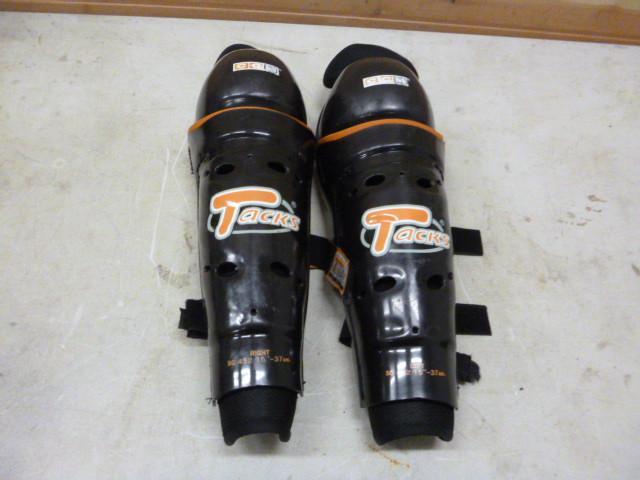 lot 50 image: CCM Tacks 15" Shin Pads...
