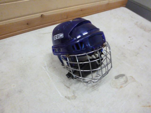 lot 52 image: CCM Hockey Helmet Left ear piece fe...