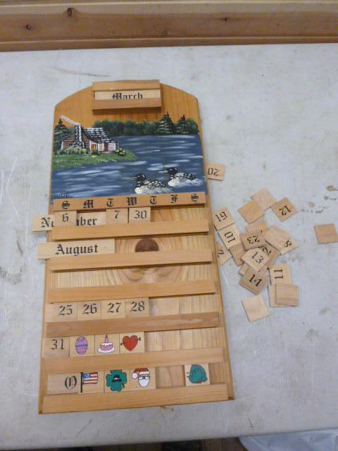 lot 75 image: Wood Tile Loon Calendar...