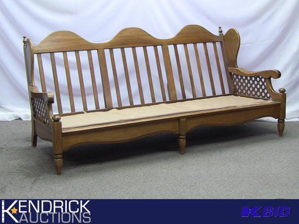 lot 3 image: Vintage Solid Pecan Wood Couch With Lattice Accents