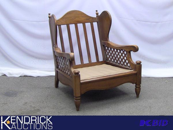lot 4 image: Vintage Solid Pecan Wood Chair With Lattice Accents