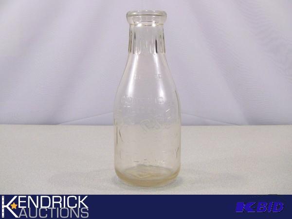 lot 87 image: Vintage Russell Creamery Milk Jug