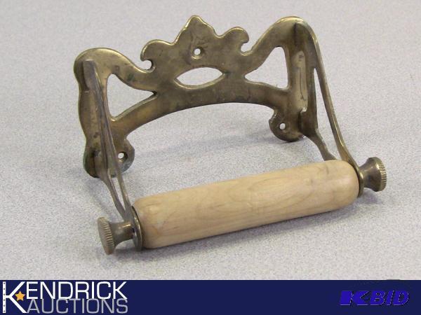 lot 93 image: Solid Brass Antique Toilet Paper Roller