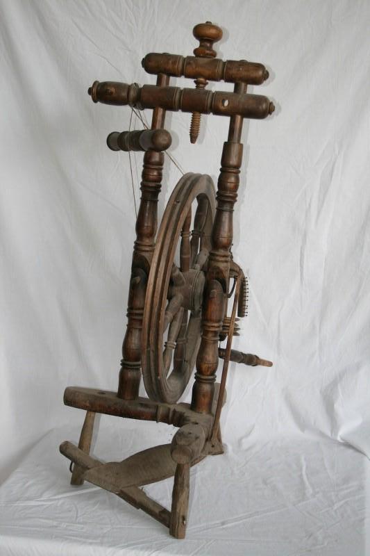Antique loomspinning wheel, one le...