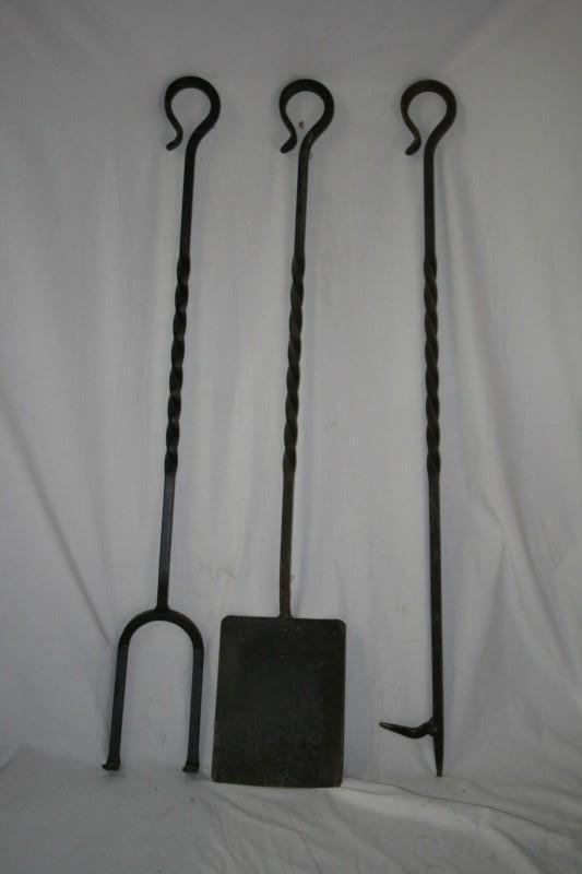 Antique, heavy iron fireplace tools...