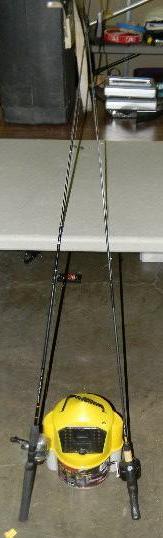 lot 156 image: Lot of 3 - two fishing poles with r...