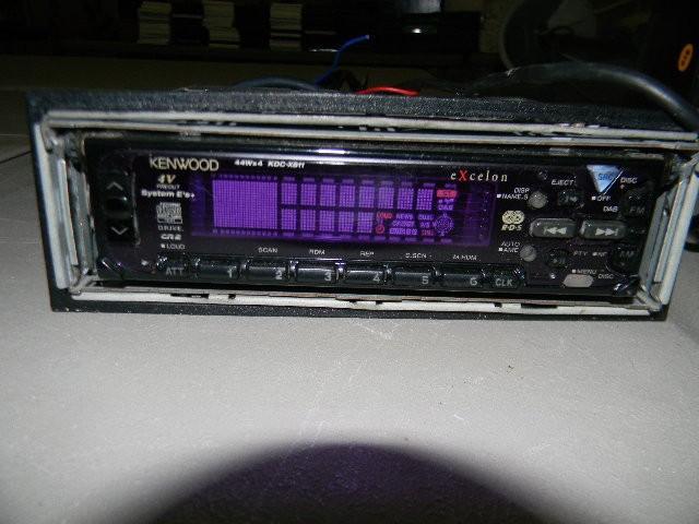 lot 211 image: Kenwood CD player with wire harness...