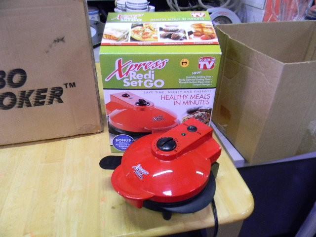 lot 57 image: Xpress Redi Set Go cooker...